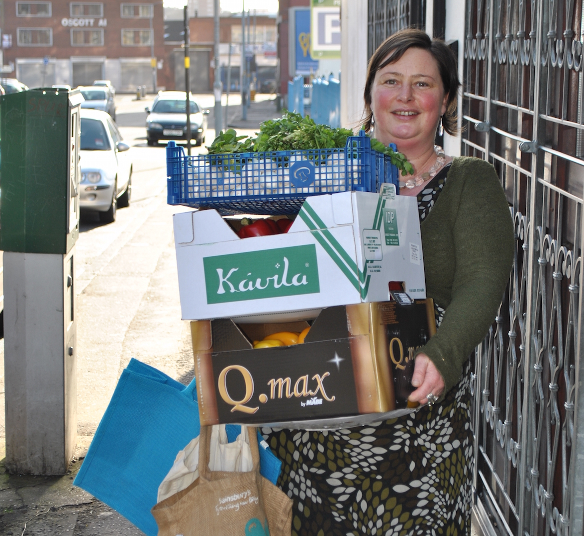 Birgit coming from the market with fresh veg