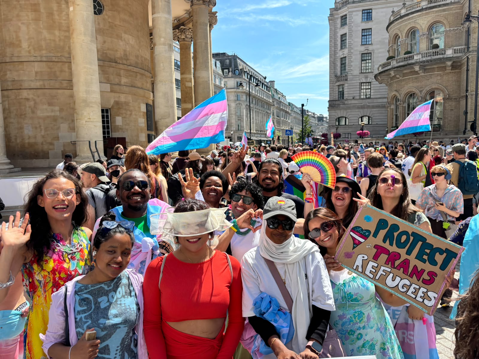 Micro Rainbow team marching in London's biggest ever Trans+ Pride march with trans beneficiaries and allies.