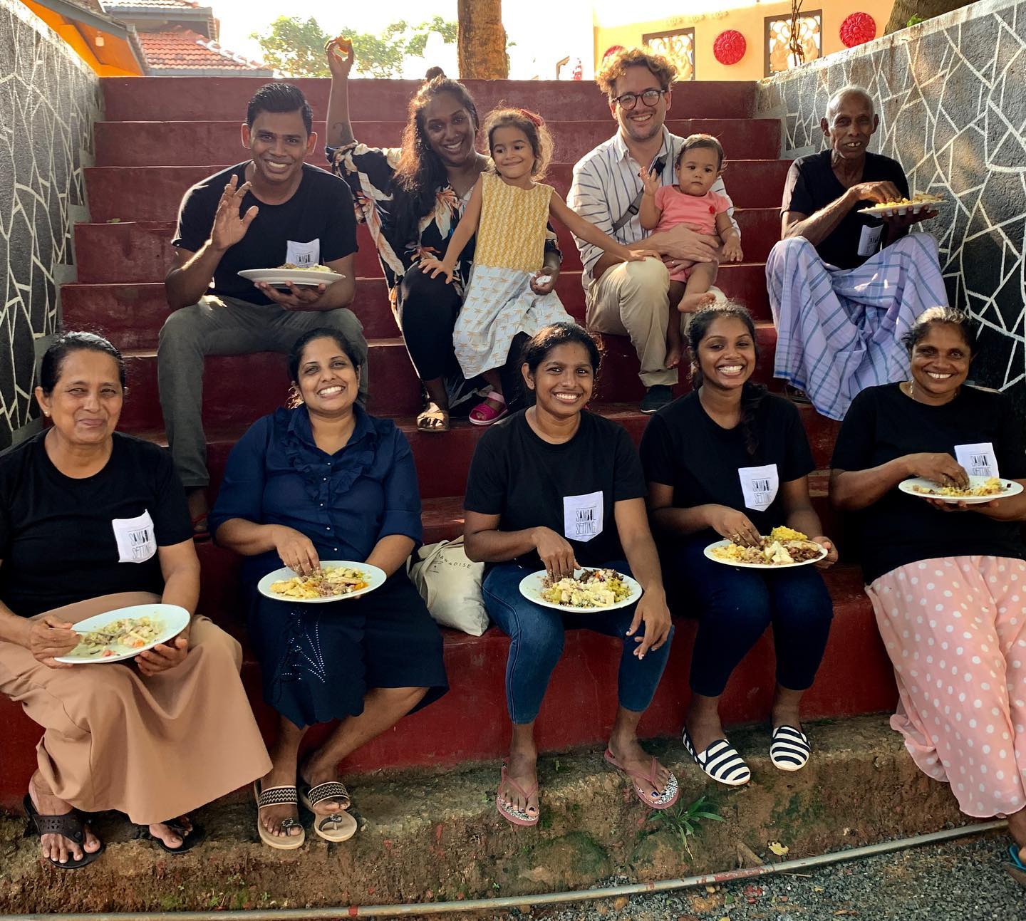 Sambol Setting feeding local women