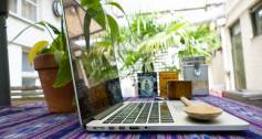 Wooden spoon on a laptop computer keyboard