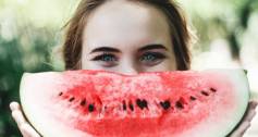 Woman with watermelon slice