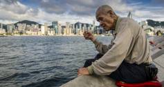 Hong Kong poverty old man fishing