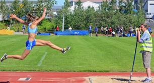 An athlete does long jump