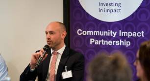 Sam Scharf Community Impact Partnership Orbit