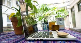 Wooden spoon on a laptop computer keyboard