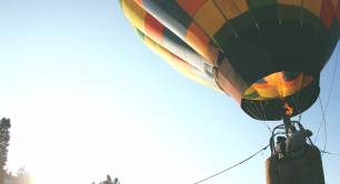 hot air balloon on its way up