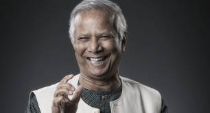Muhammad Yunus laughing