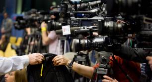 Press conference cameras