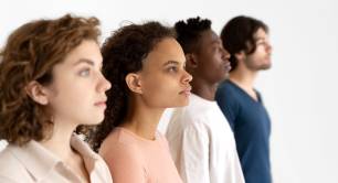 A group of diverse people looking in the same direction
