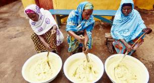 Women making fair trade shea butter for The Body Shop in 2018