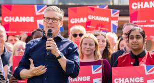 Keir Starmer in front of Labour campaigners