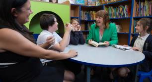 Lisa Nandy and Rachel Reeves with some children in a school in Wigan
