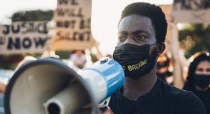 Black Lives Matter protestor with megaphone
