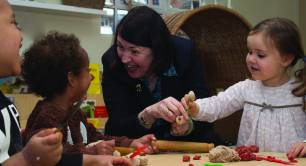 June O'Sullivan at a LEYF nursery with children