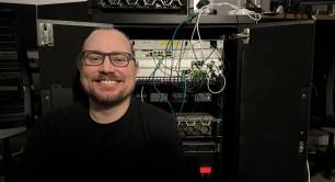 James Gauci in front of his small scale data centre