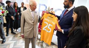 King Charles presented with a Bradford City shirt at the launch of Impact Hub Yorkshire