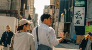 People walk in side streets in Osaka, Japan
