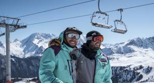 Skiers in jackets repaired by Re-Action