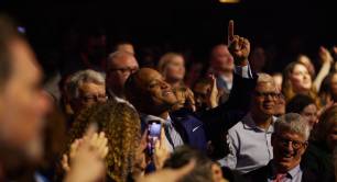 Wes Moore, Governor of Mariland, US, and Don Gips in a crowd at Skoll World Forum 2023