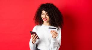 Woman shopping online via smartphone