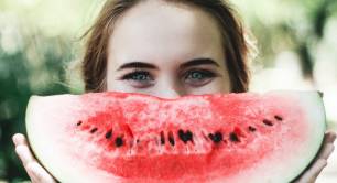 Woman with watermelon slice