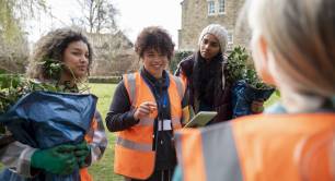 Women volunteers gardening