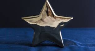 Gold star on blue sheet