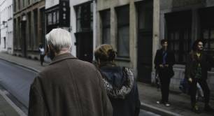 people walk in a city centre